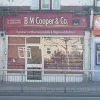 B M Cooper